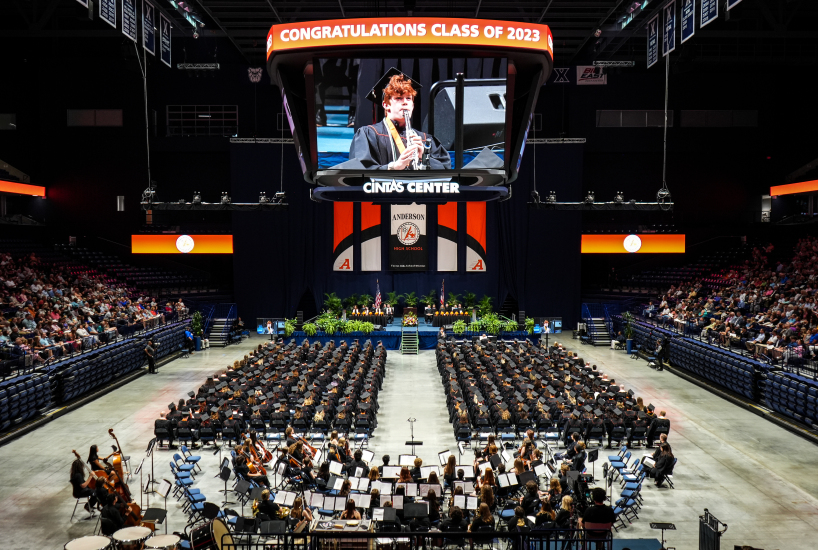 The Anderson High School Class of 2023 watches the student solo performance at graduation